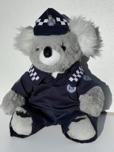 Koala Cop in police uniform